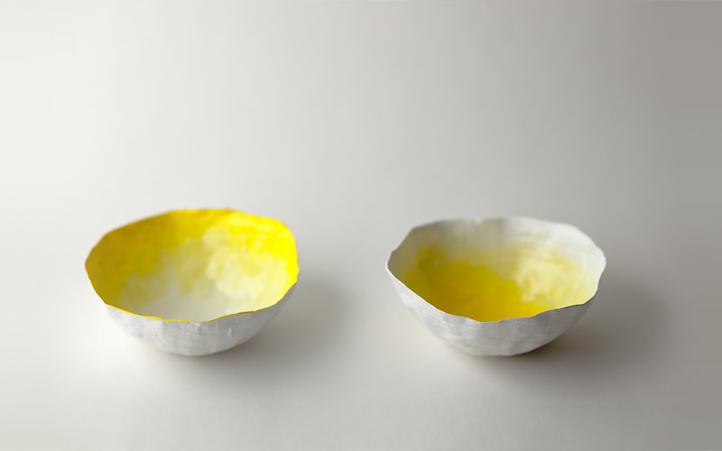 Photo of small yellow bowls